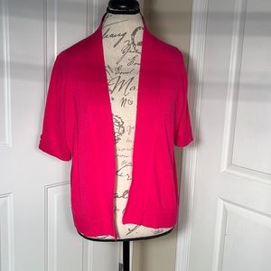 Hot pink cardigan.
